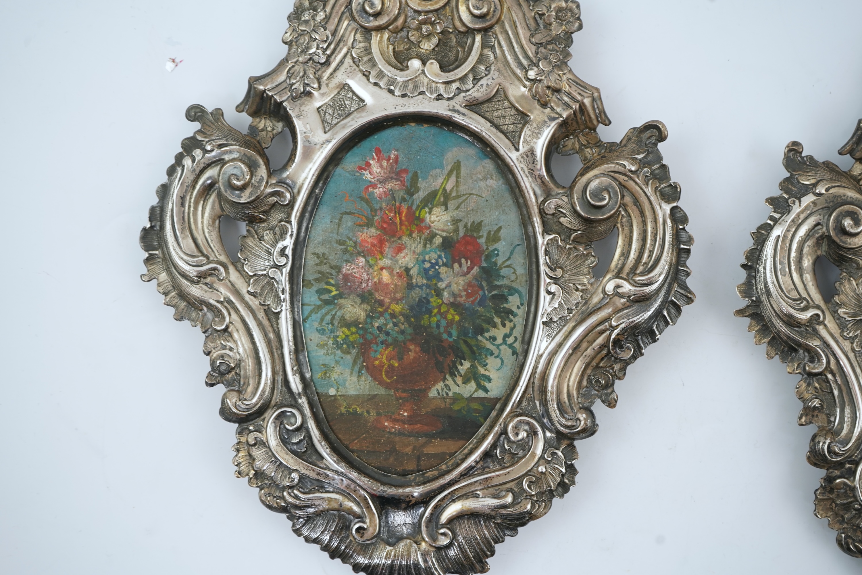 A pair of 18th century Italian Rococo repousse silver frames